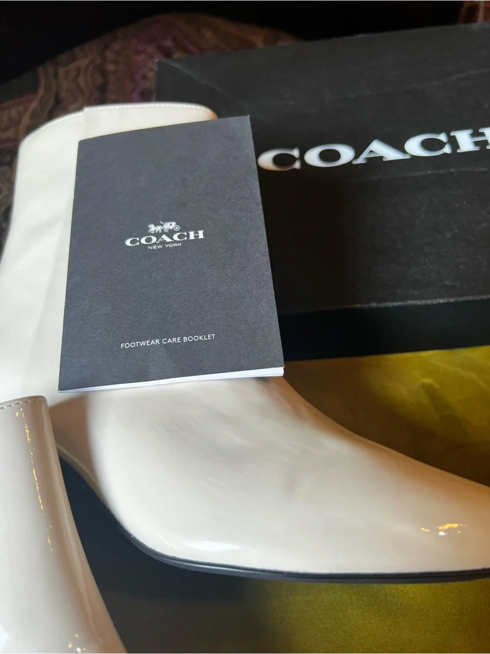 Coach glossy white